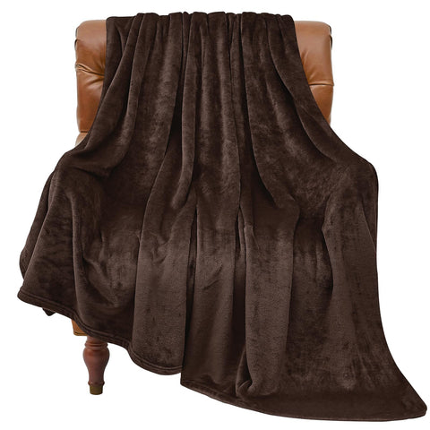 BEDELITE brown fleece blanket folded on a couch for cozy evenings.