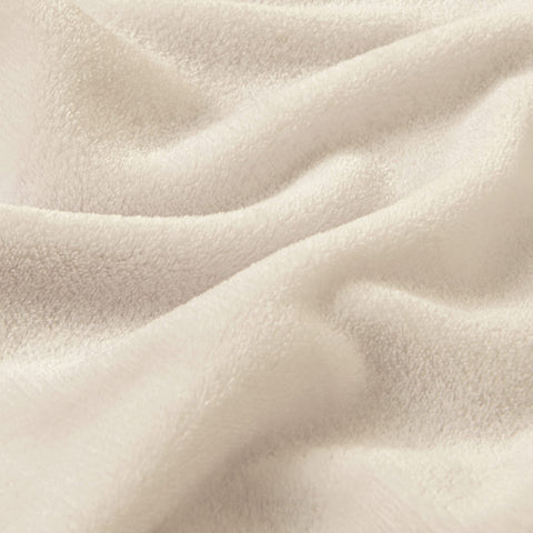 BEDELITE blanket on sofa during TV time offers warm cover.