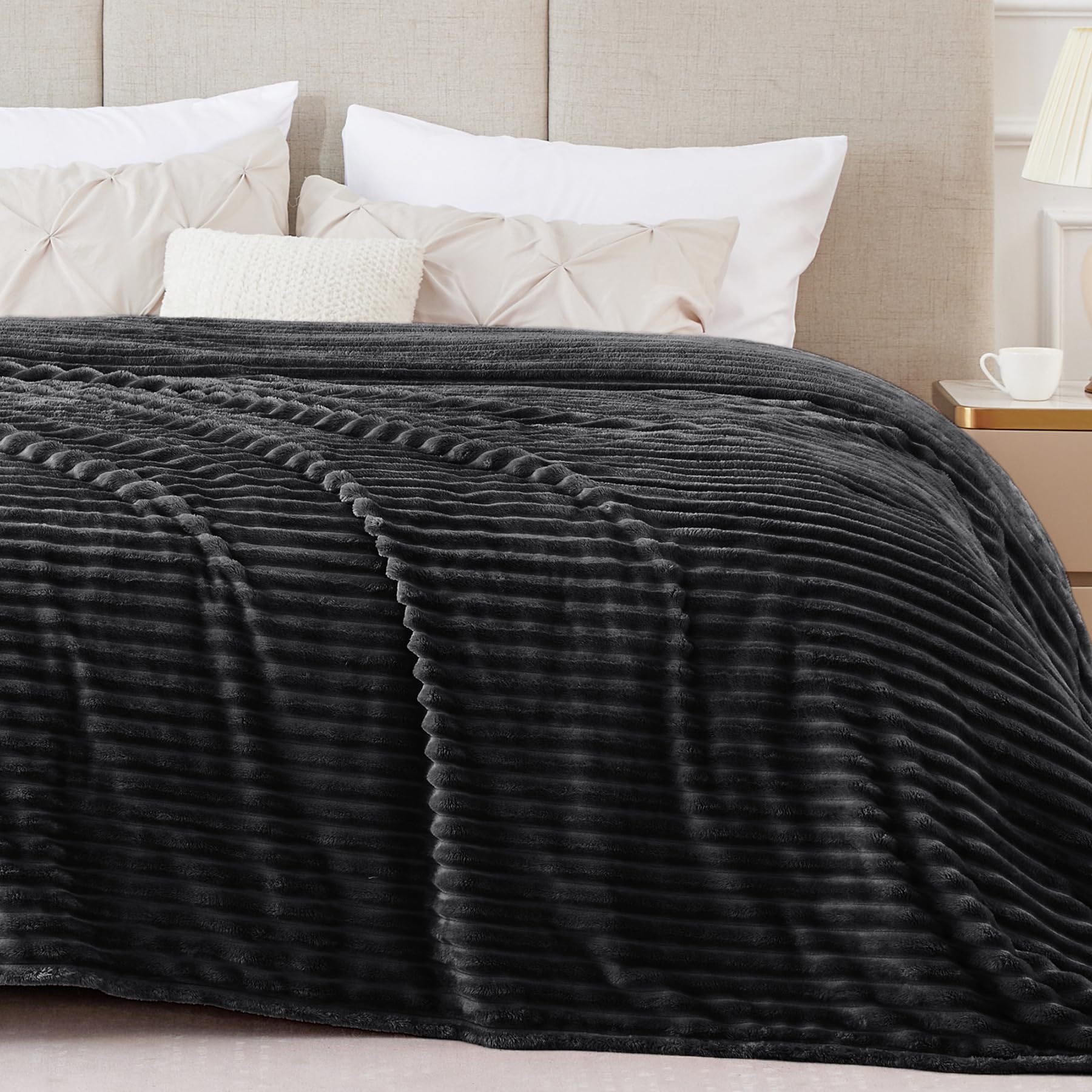 BEDELITE king-size fleece blanket with 3D ribbed jacquard adds warmth and style.