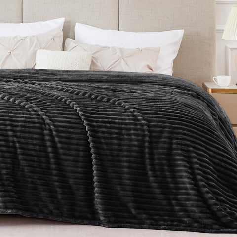 BEDELITE king-size fleece blanket with 3D ribbed jacquard adds warmth and style.