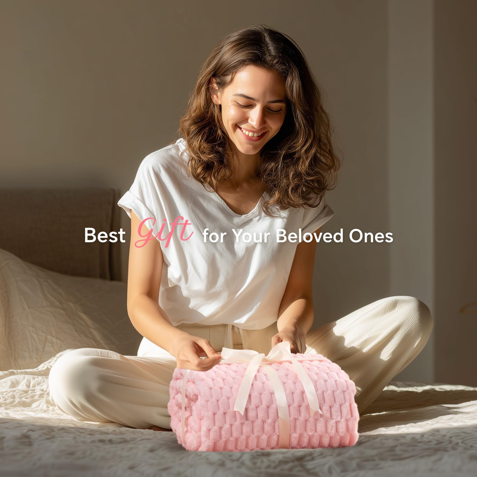 BEDELITE pink-hued fleece blanket adds decorative warmth to any room.