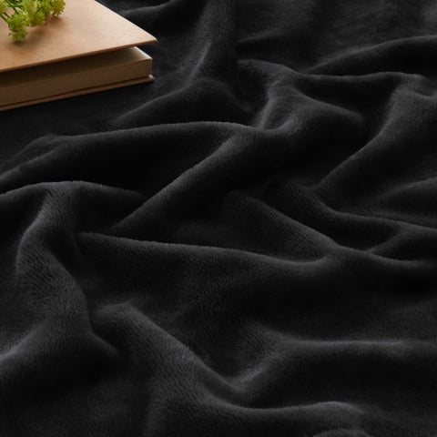 BEDELITE king-size blanket on couch creating a comfortable lounge area.