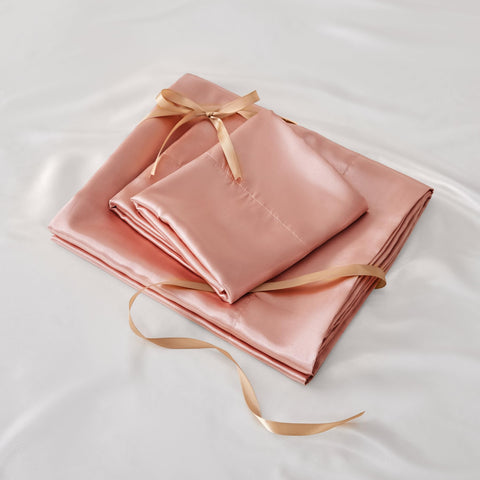 BEDELITE satin with 15-inch deep pockets stays snug on tall mattresses.