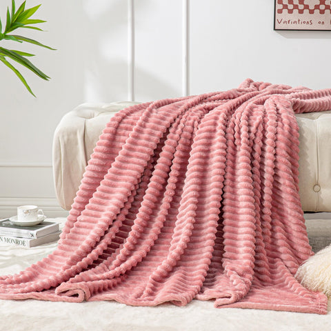BEDELITE plush blanket on sofa inviting restful moments