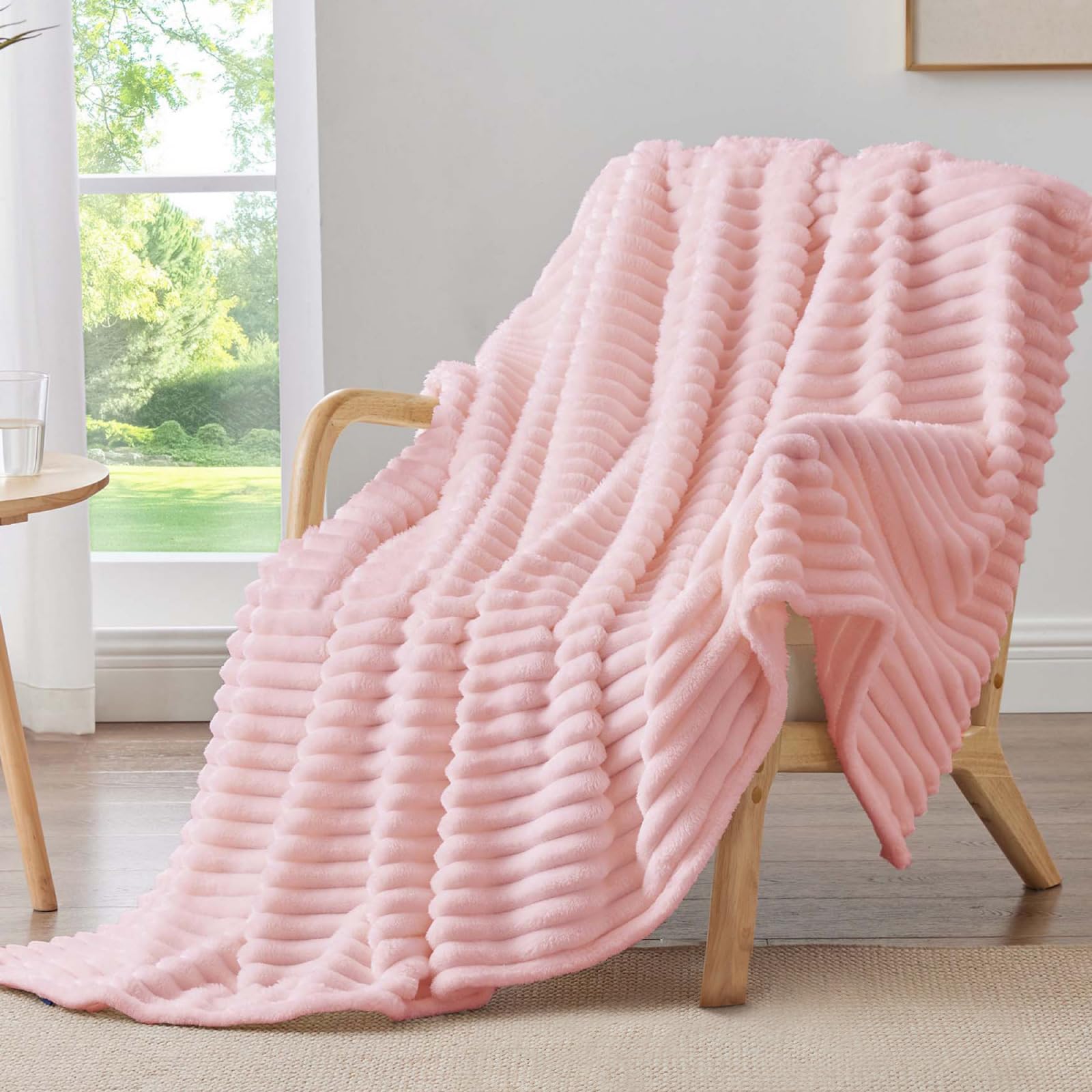 BEDELITE throw blanket soft-fleece-pink adds cozy warmth to the couch