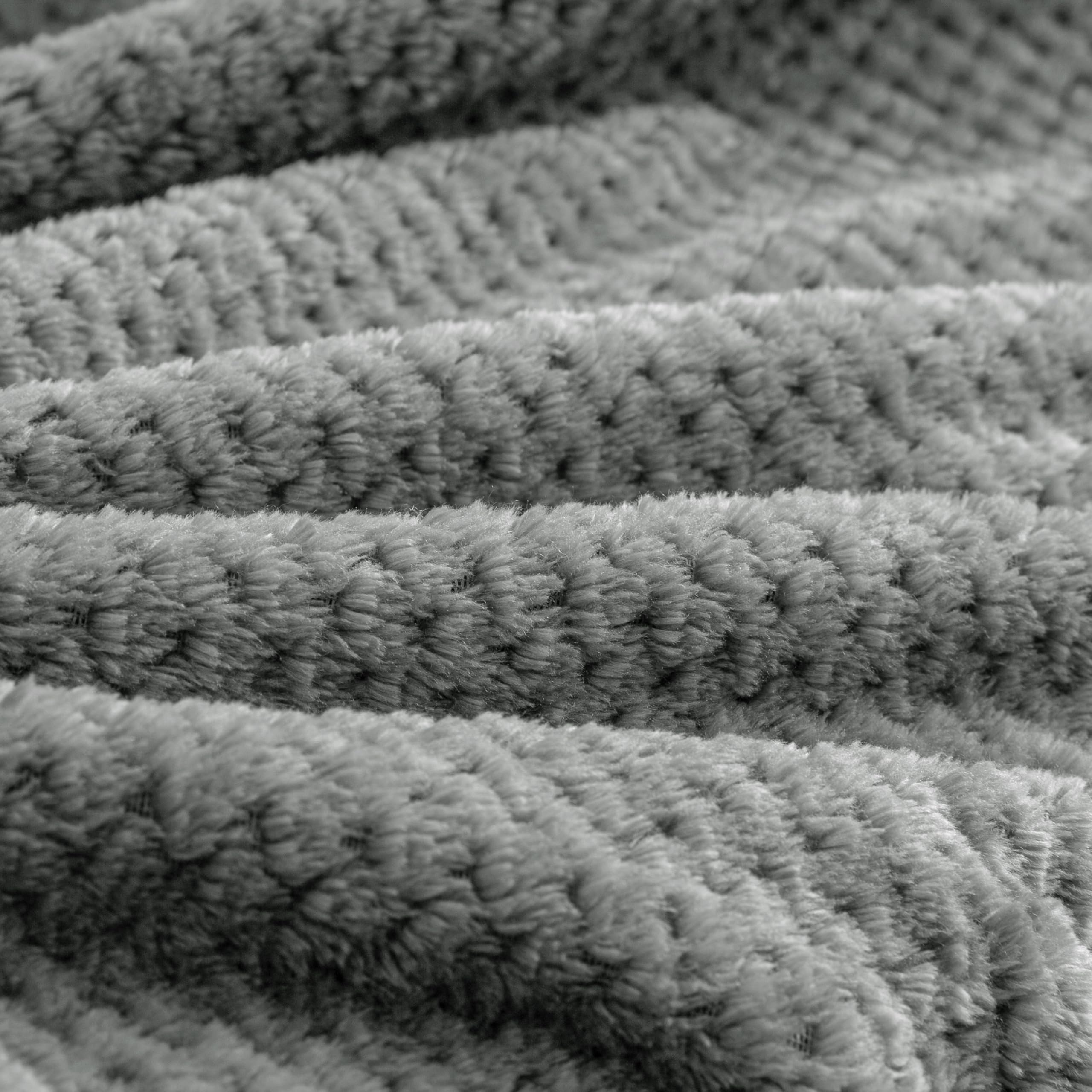 BEDELITE airplane-ready blanket offers soft warmth during flights