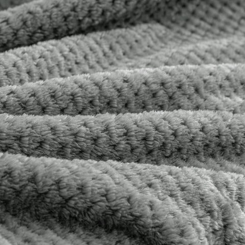 BEDELITE airplane-ready blanket offers soft warmth during flights