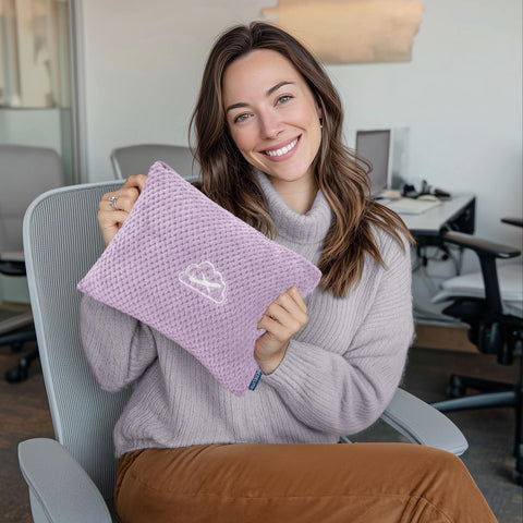 BEDELITE blanket attached to luggage sleeve on a suitcase for hands-free travel.