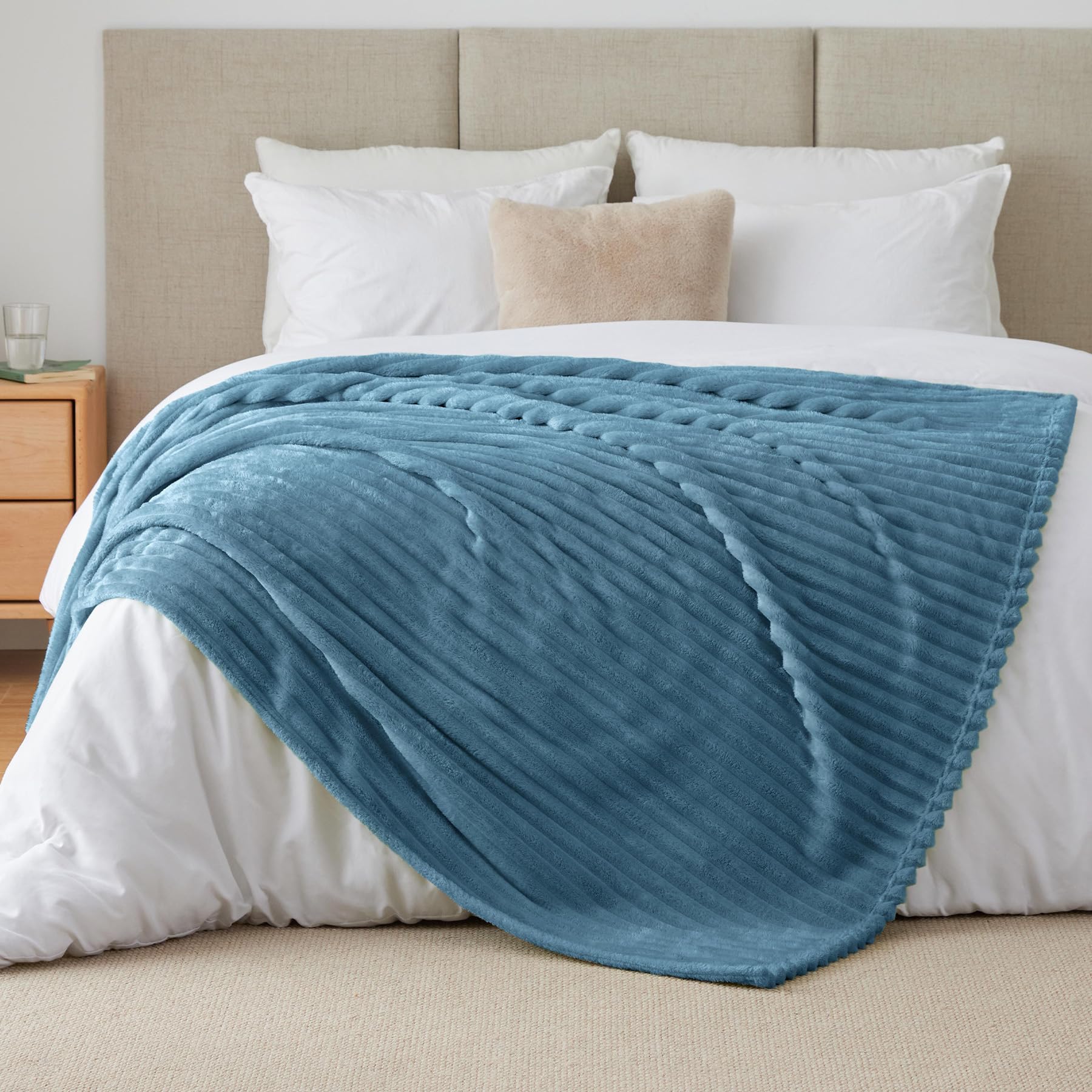 BEDELITE striped light blue blanket showing durable stitching for longevity