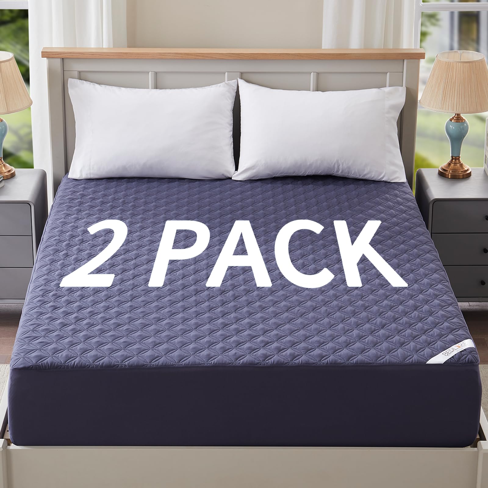 BEDLORE mattress protector with coin quilt pattern in navy for stylish protection