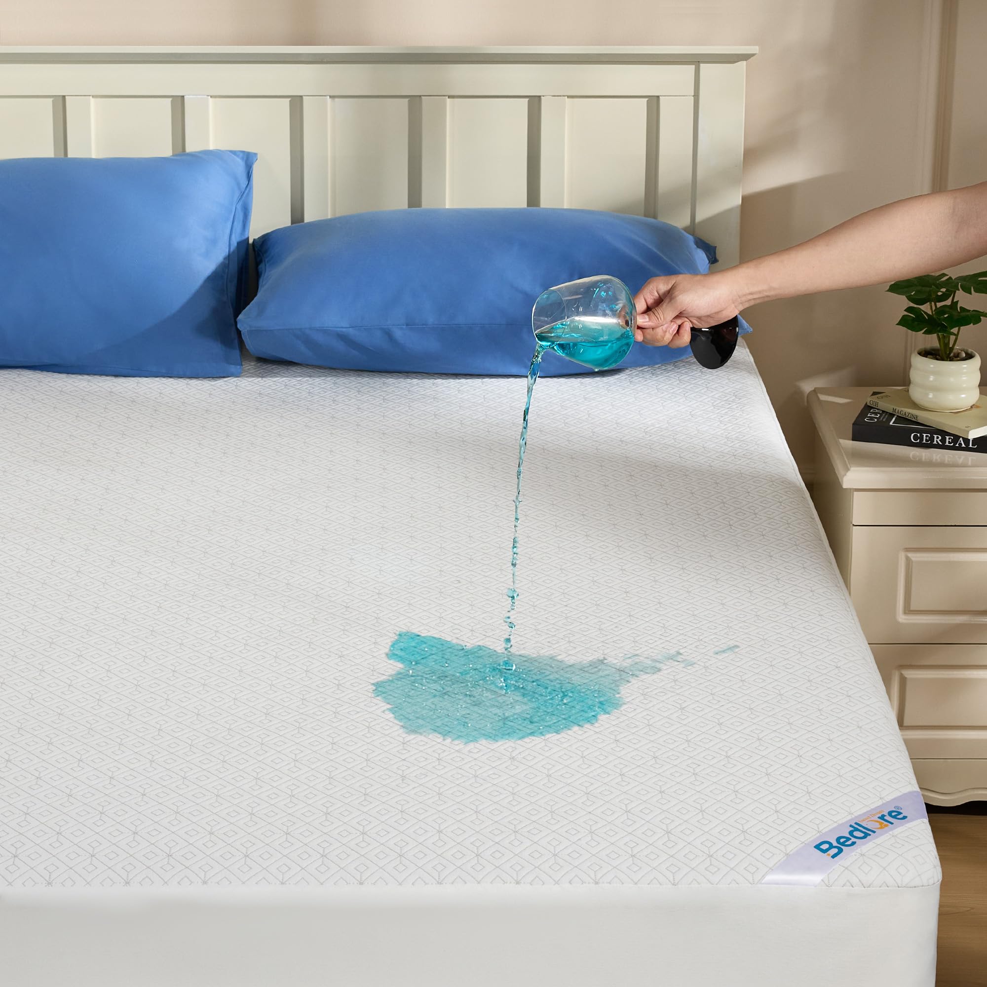 BEDLORE King Mattress Protector waterproof image highlighting spill protection and durability