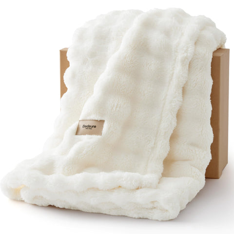 Bedsure 3D fleece bubble blanket on couch adds soft texture and cozy comfort.