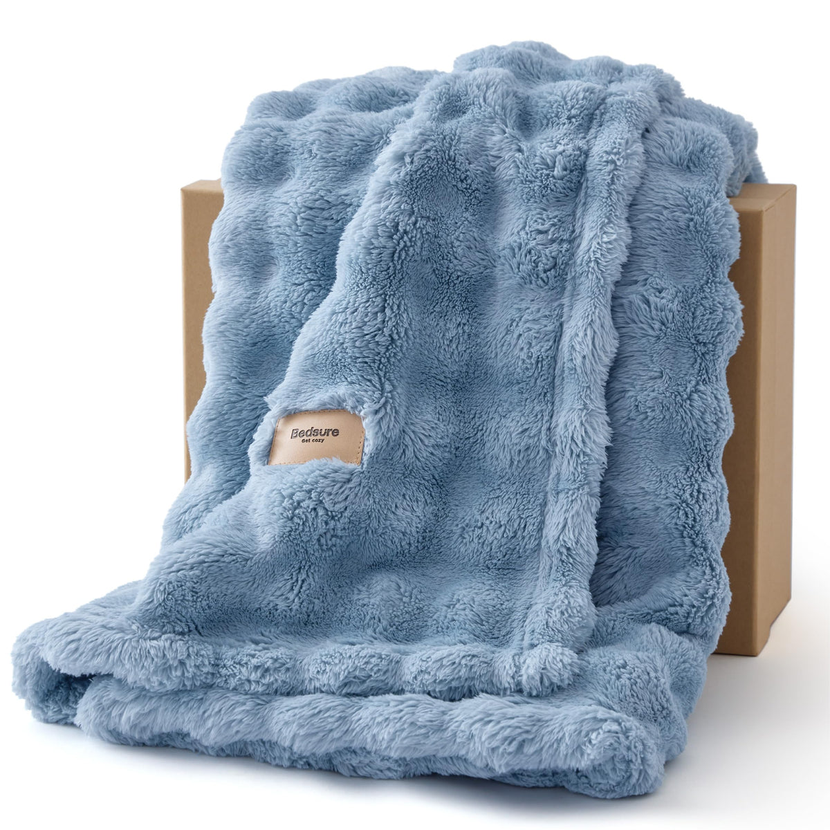 Bedsure 3D Fleece Bubble texture close-up highlights plush softness for cozy lounging.