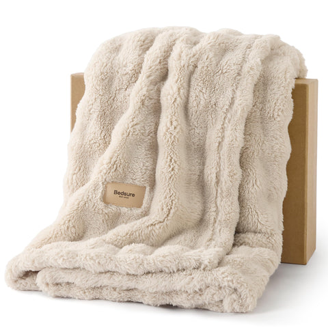 Bedsure 3D fleece bubble texture closeup for cozy sofa lounging.