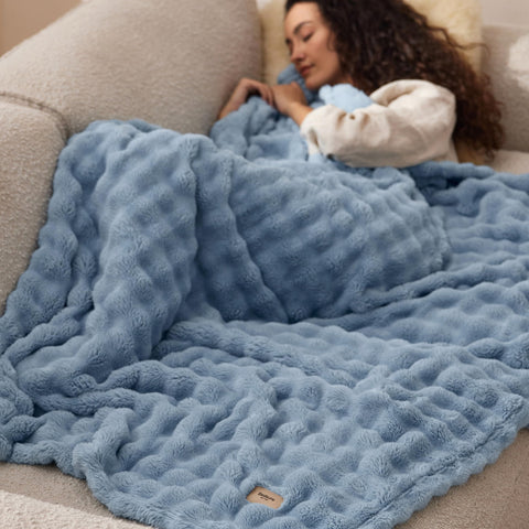 Bedsure 50x60 blanket size suitable for couches and beds.