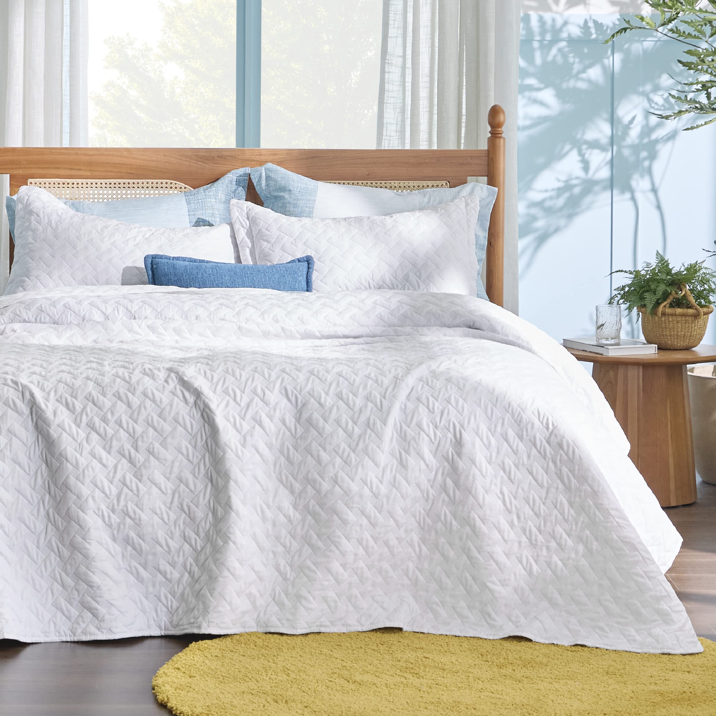 Bedsure quilt close-up of 85gsm brushed shell highlights gentle, cozy touch.