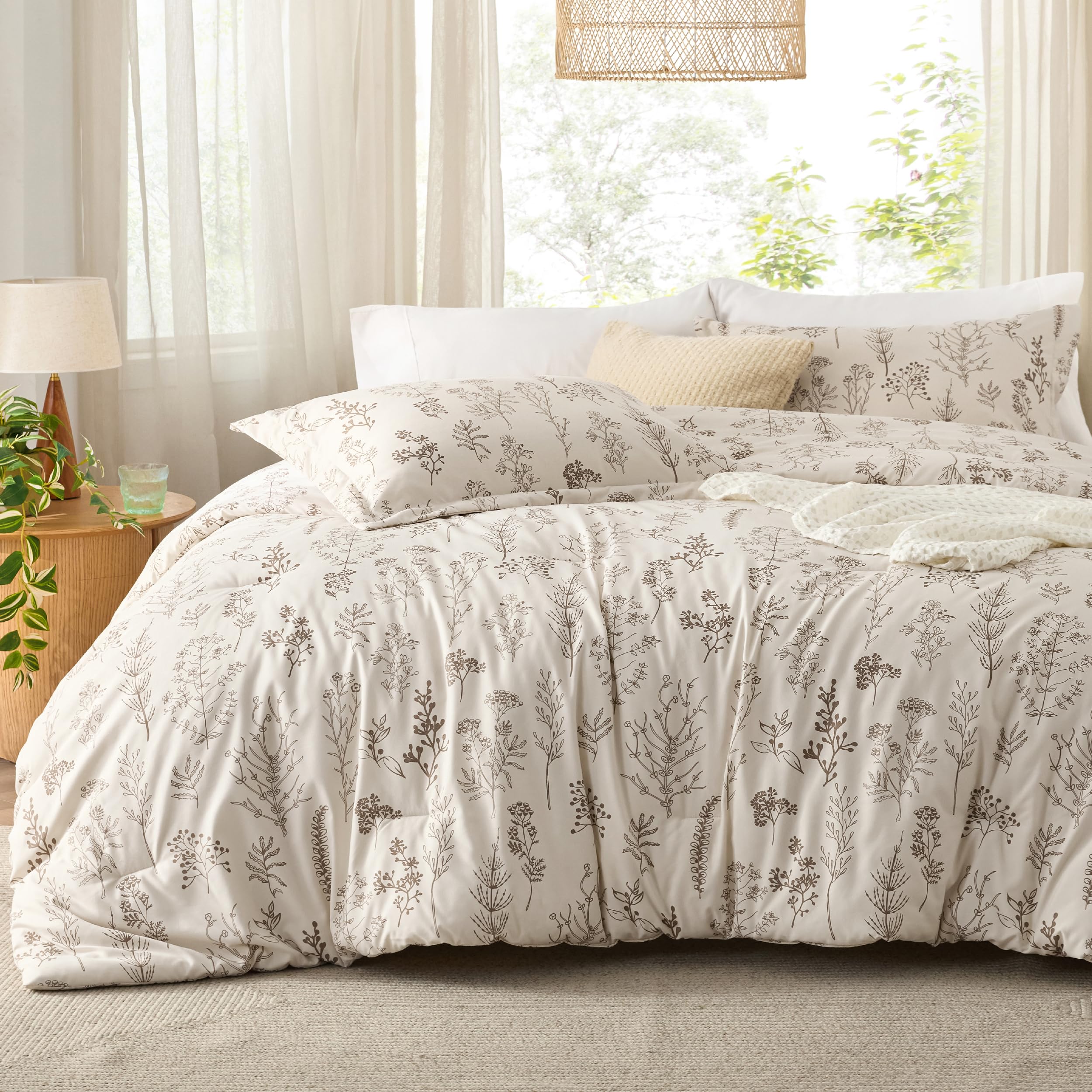 Bedsure beige floral reversible comforter set on a bed for versatile decor
