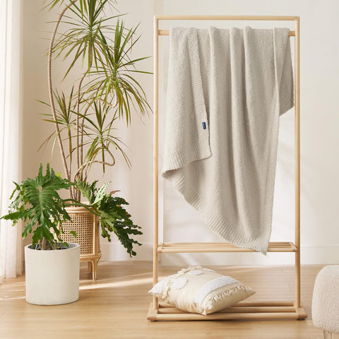 Bedsure cozy throw complements couches and chairs in modern homes.