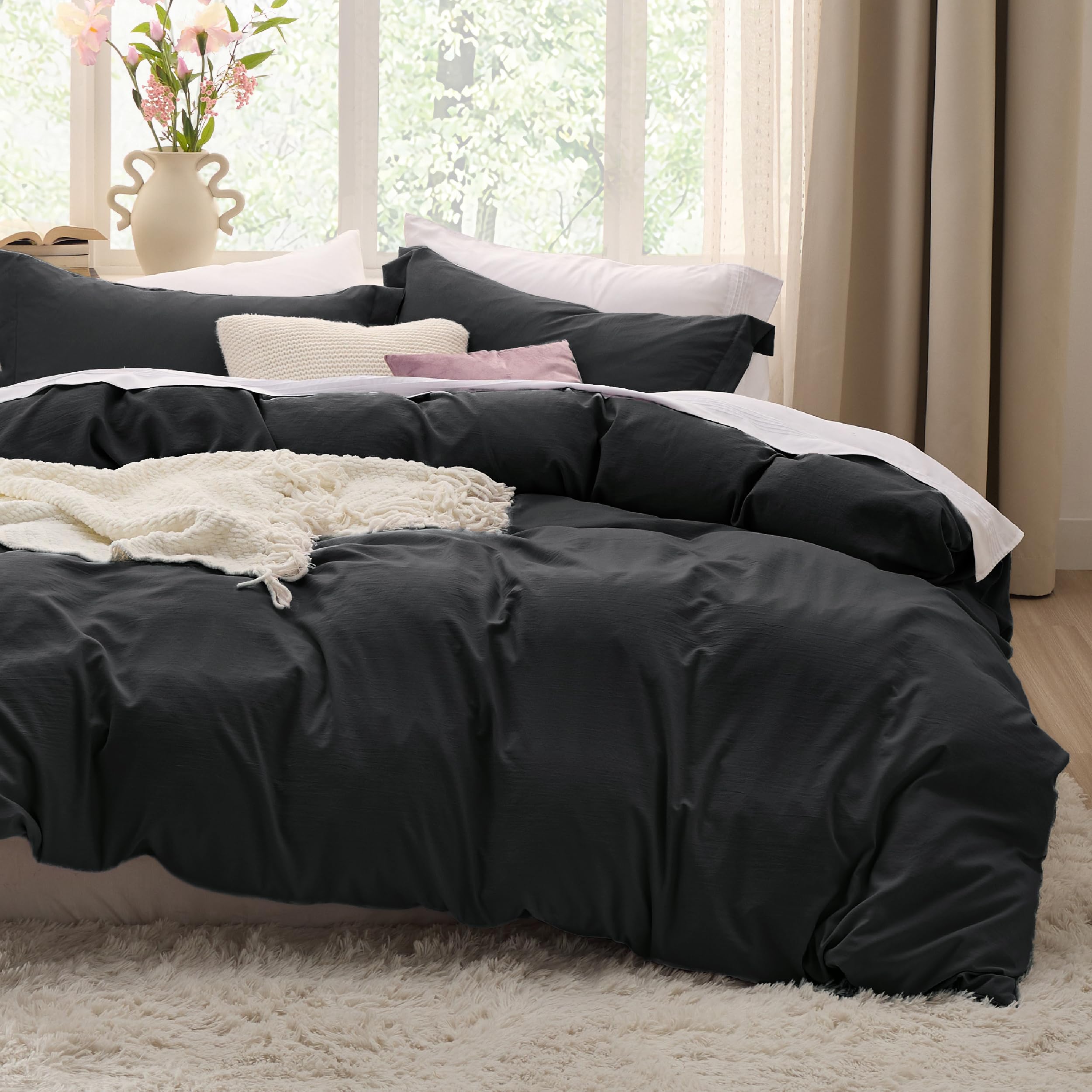 Bedsure black duvet cover queen 90x90 on bed highlights soft microfiber comfort.