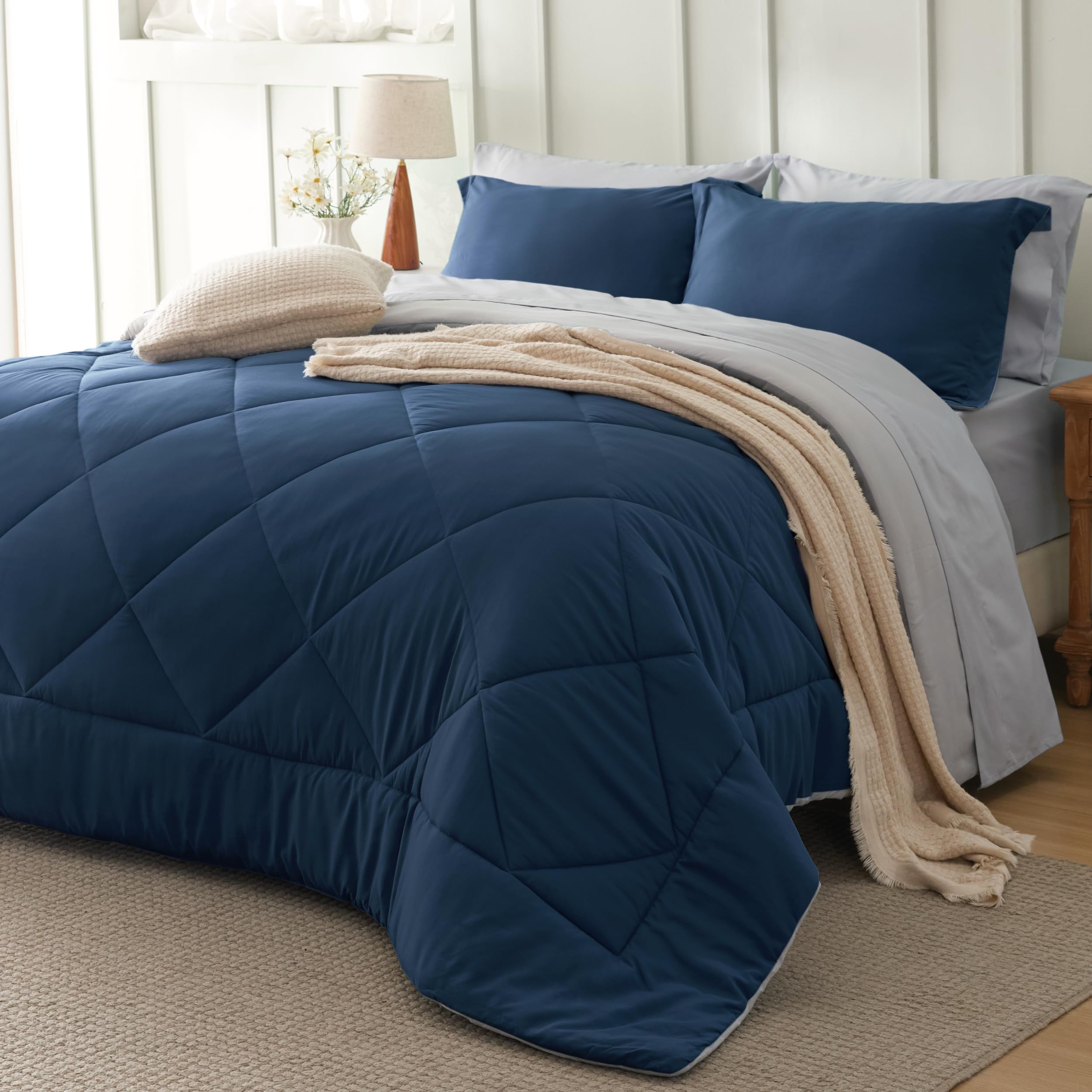 Bedsure blue queen comforter set on bed showing 7-piece bundle for all-season warmth