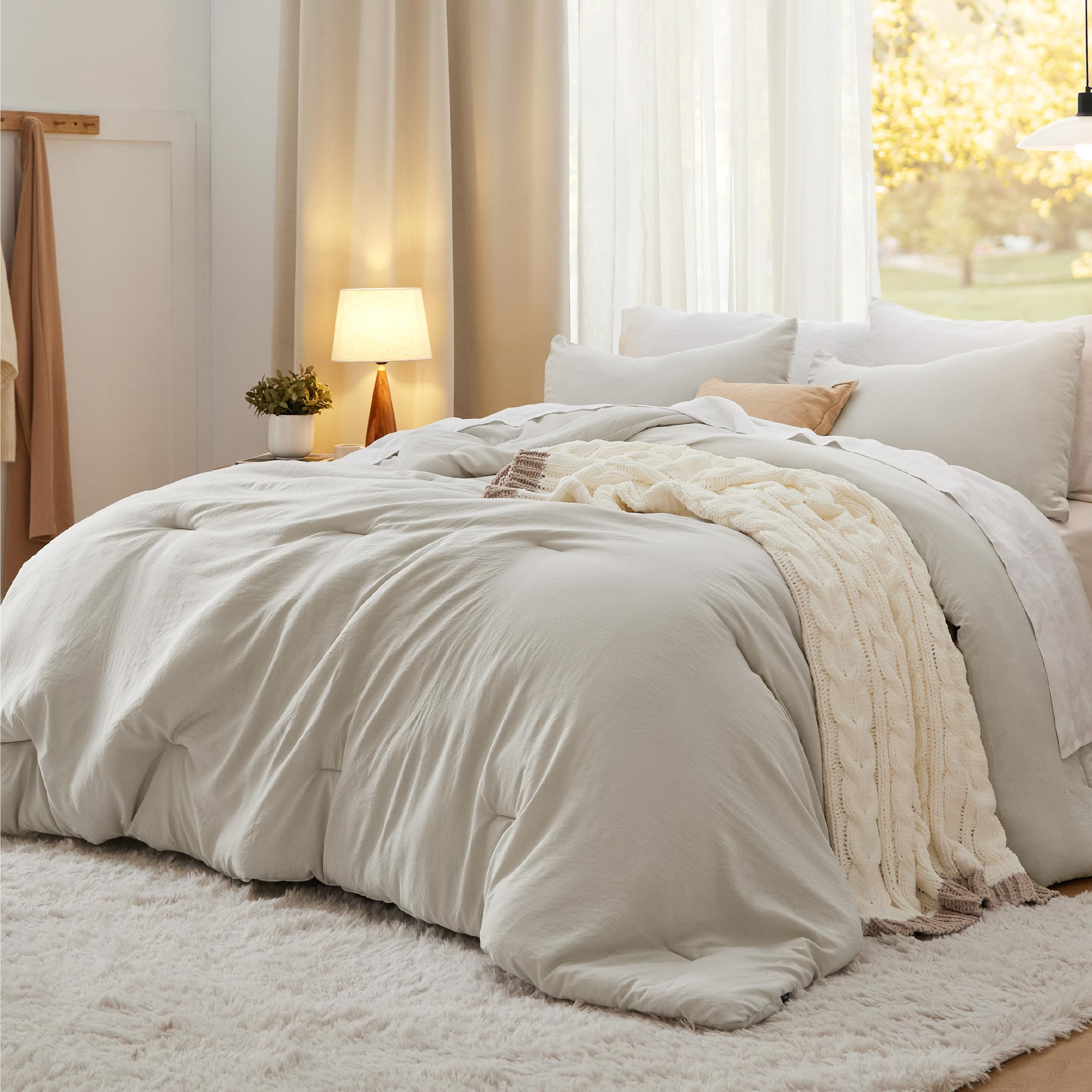 Bedsure California King Comforter in beige fabric for soft, skin-friendly comfort.
