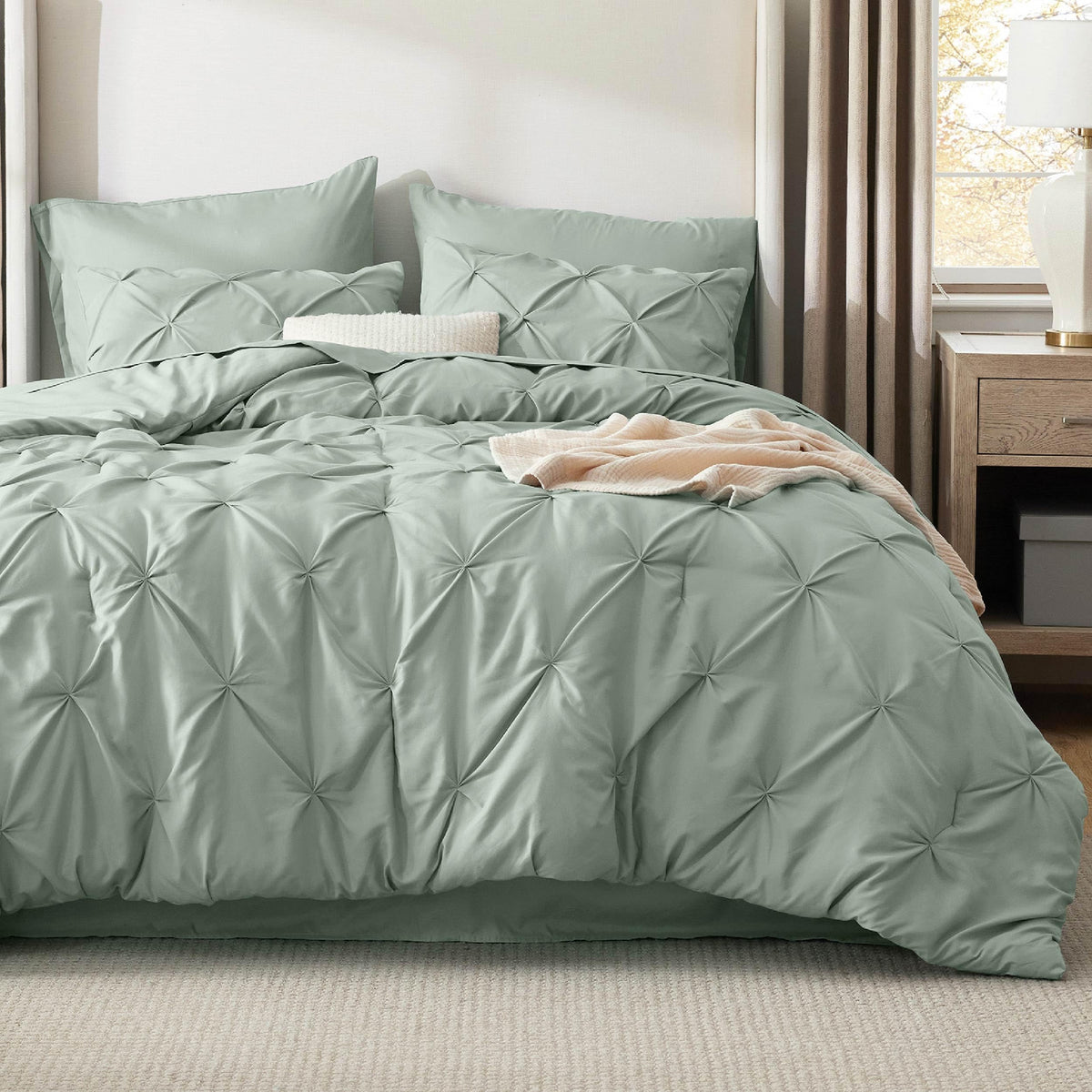 Bedsure California King pinch-pleat comforter in sage green for a plush look