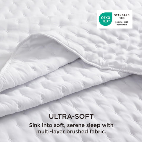Bedsure California King quilt with embossed clover pattern adds texture.