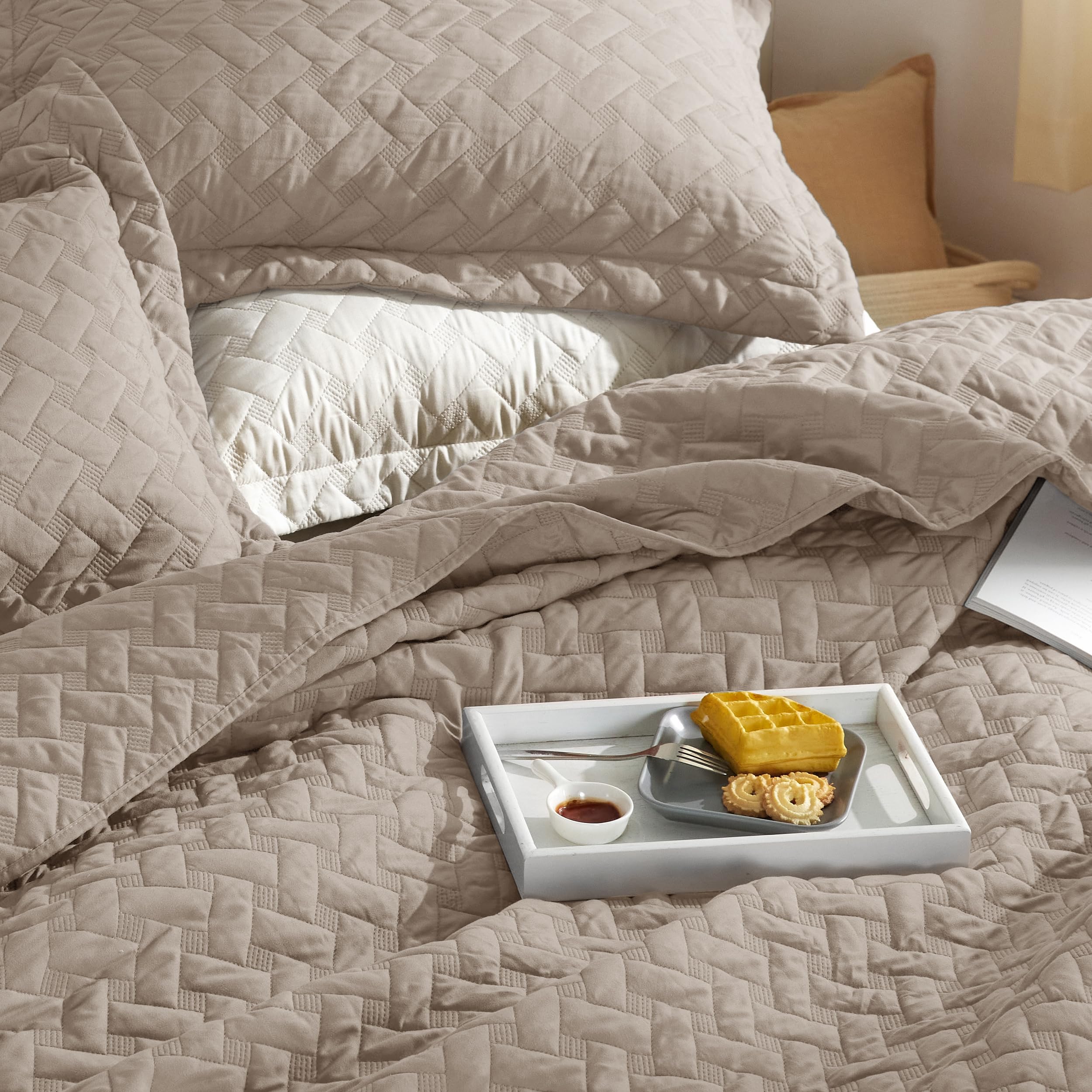 Bedsure quilt in taupe color enhances bedroom decor