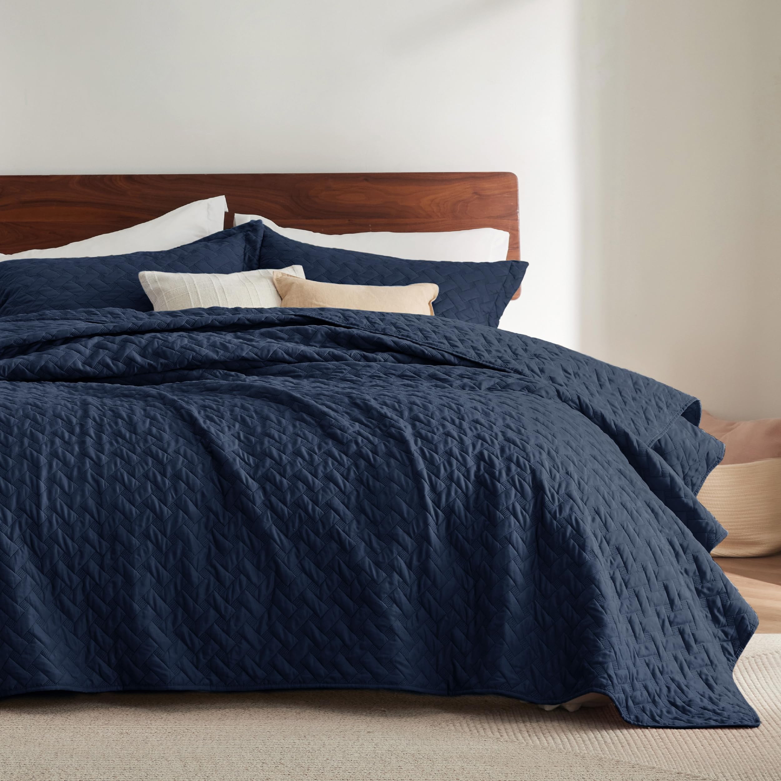 Bedsure California King Quilt with basket weave pattern adds refined texture to navy bedroom