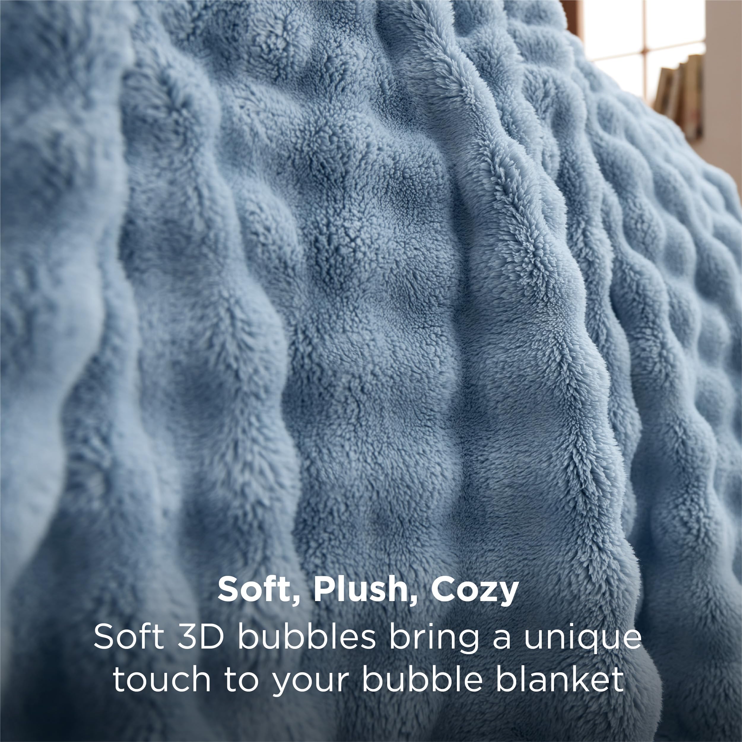 Bedsure Celestial Blue throw enhances bedroom decor with soft texture.