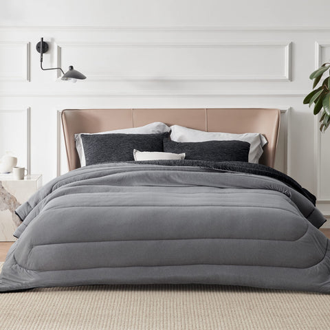 Bedsure charcoal black pillowcases close-up emphasizing soft feel.