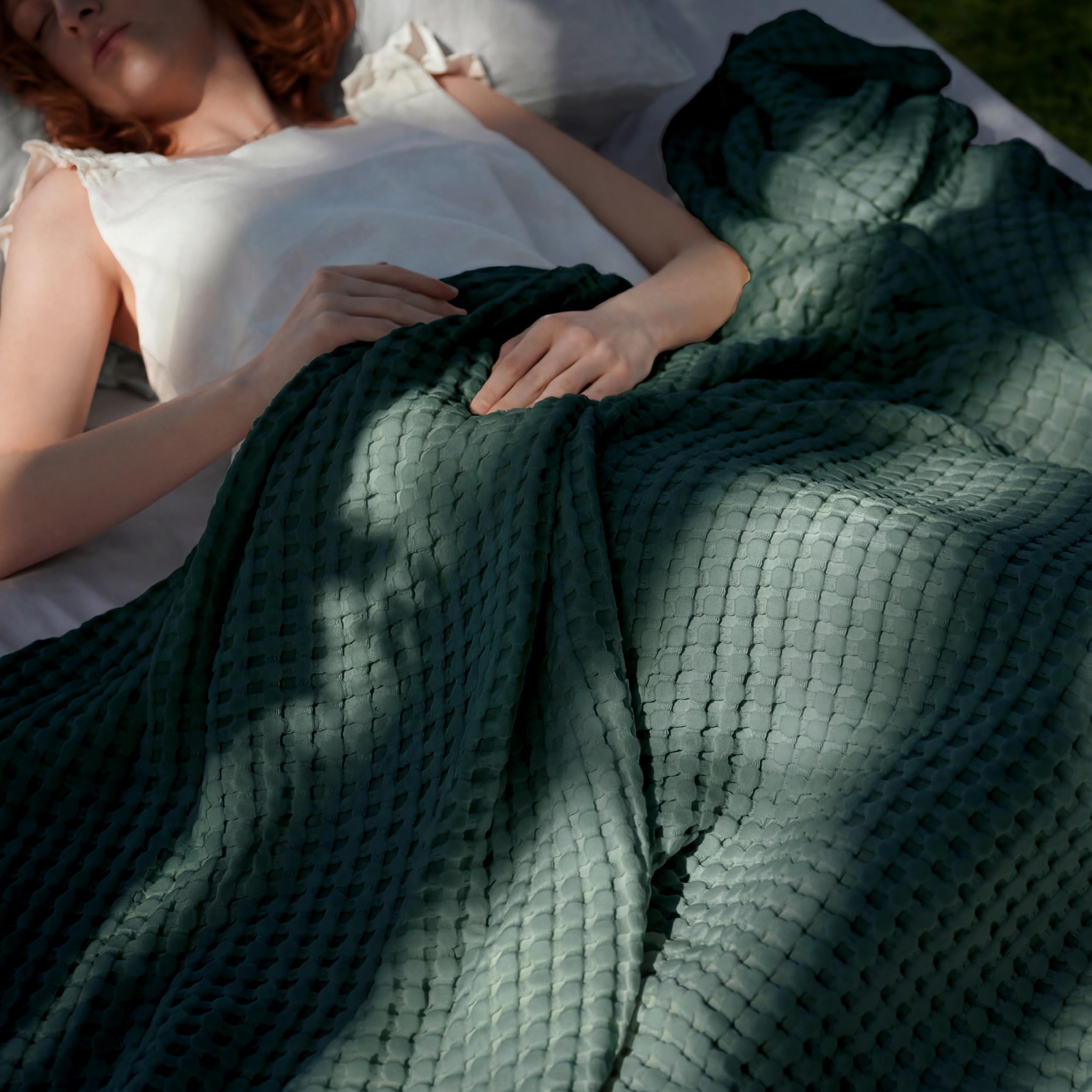 Bedsure cooling cotton waffle blanket folded, showcasing soft texture and versatile year-round comfort.