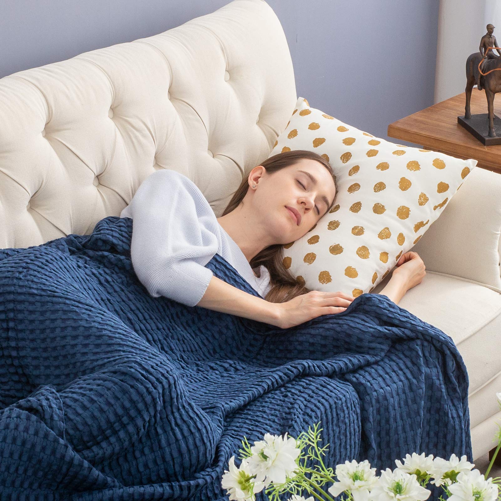 Bedsure blanket folded on bed, highlighting compact warmth and easy drape