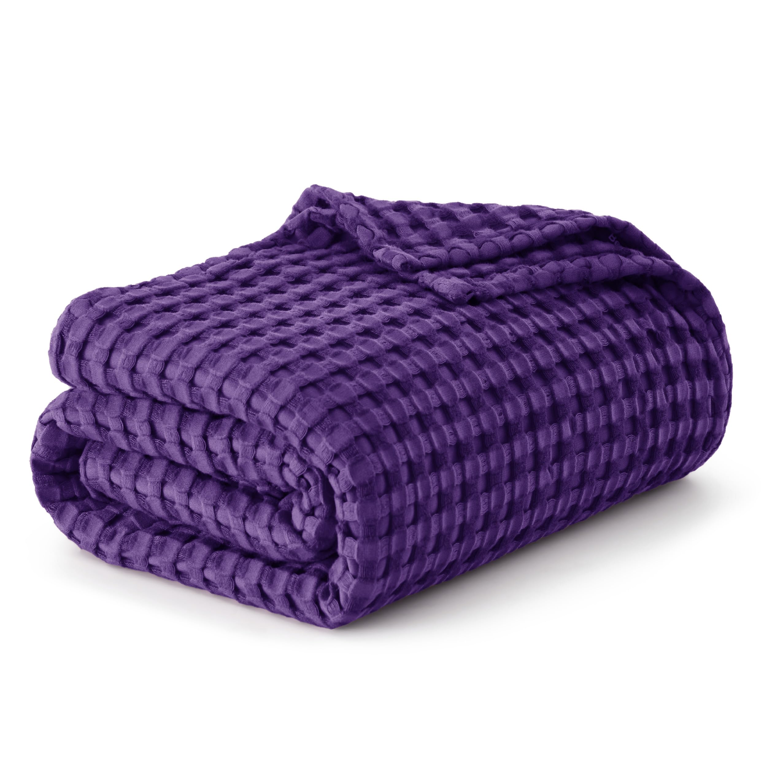 Bedsure cooling cotton waffle king blanket piled and folded, showing generous size and texture.