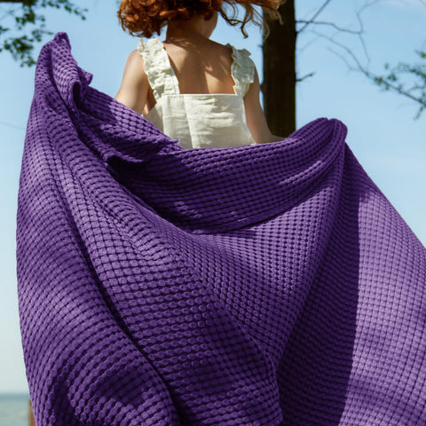 Closeup of Bedsure waffle texture in purple, highlighting breathability.