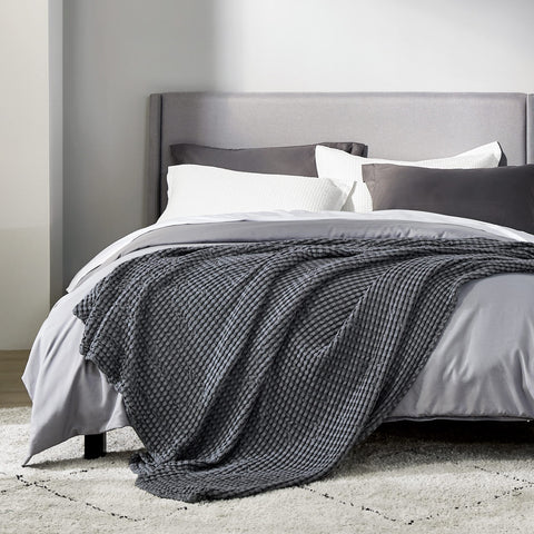 Bedsure dark grey blanket on sofa adds casual luxury