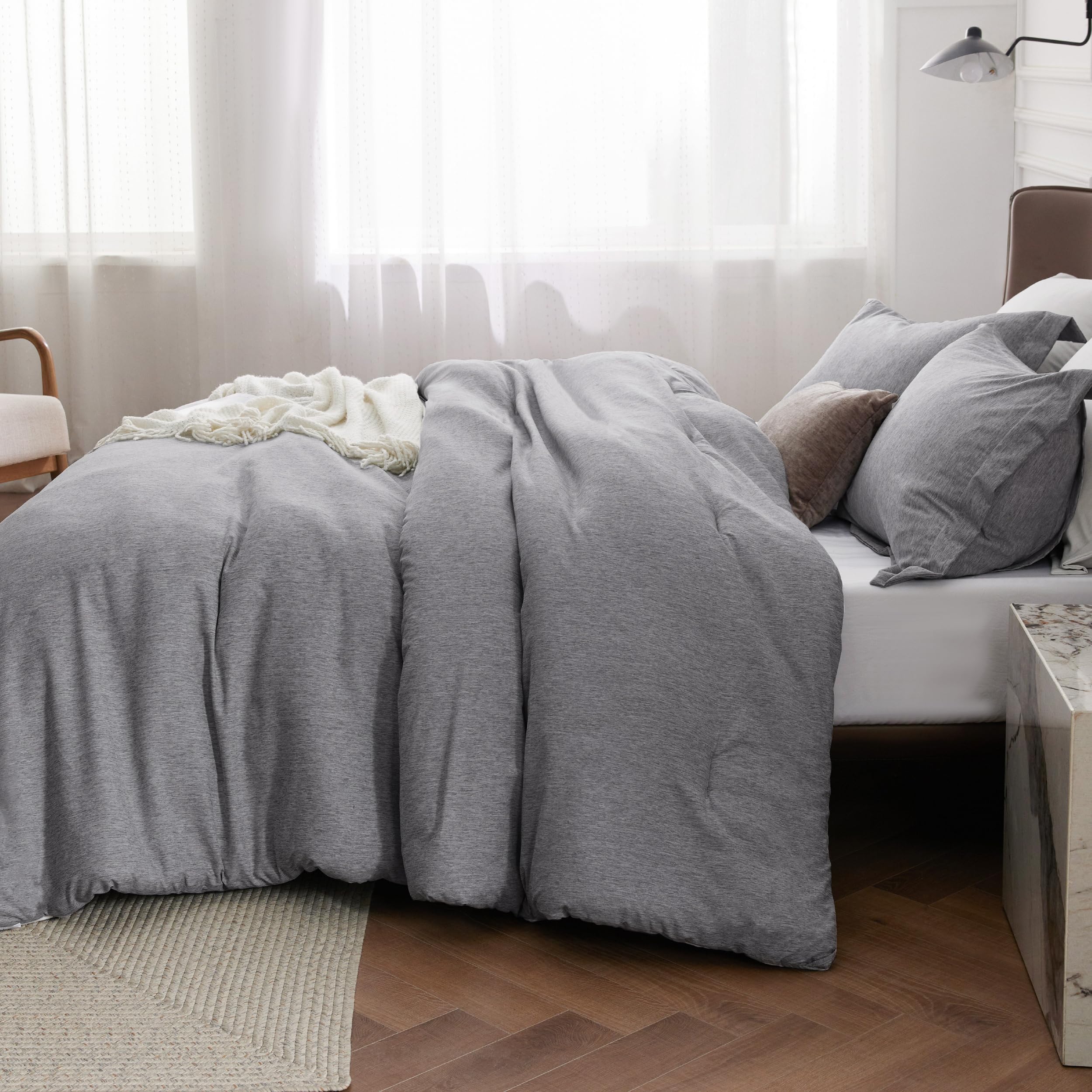 Bedsure dark grey comforter with cationic dyed dual-color finish.