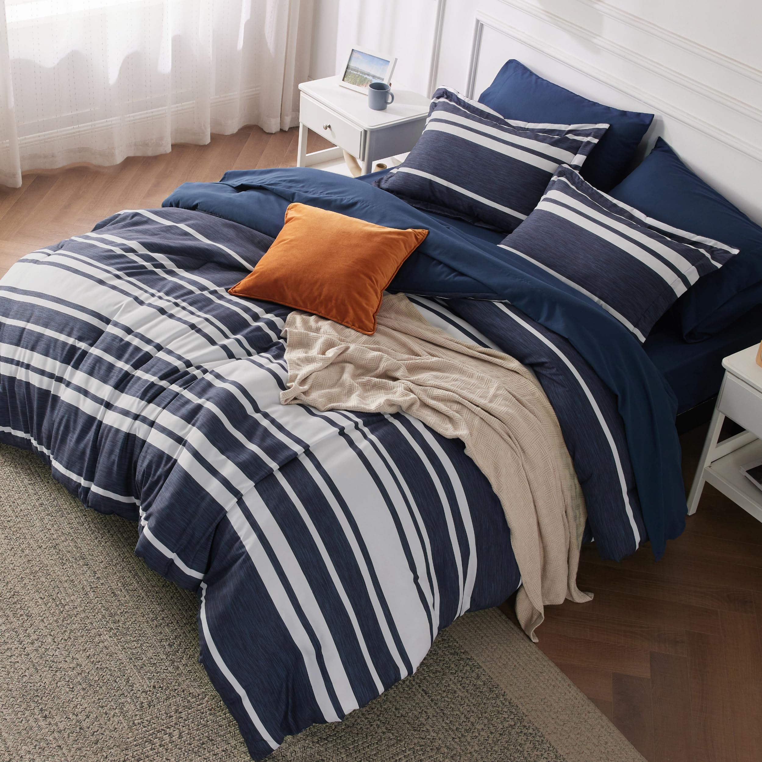 Bedsure full comforter set in blue striped close-up for soft texture.