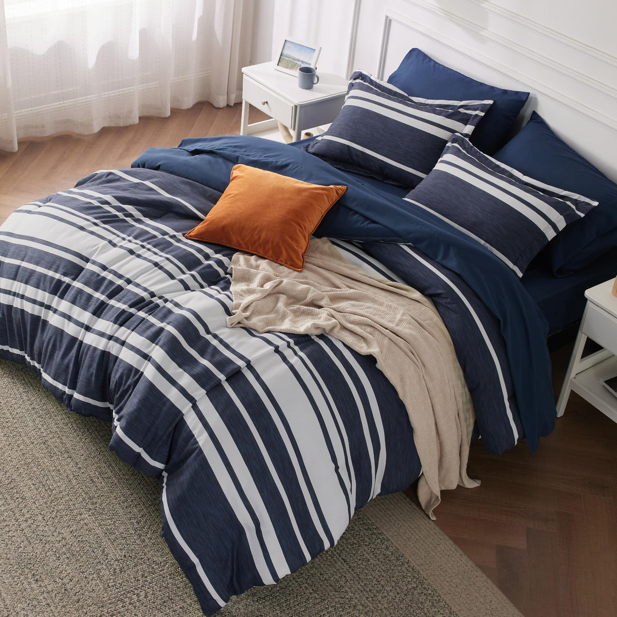Bedsure full comforter set in blue striped close-up for soft texture.