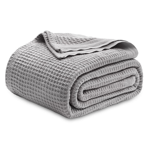 Bedsure Gentlesoft cotton blanket on bed delivers breathable, cool comfort all night.