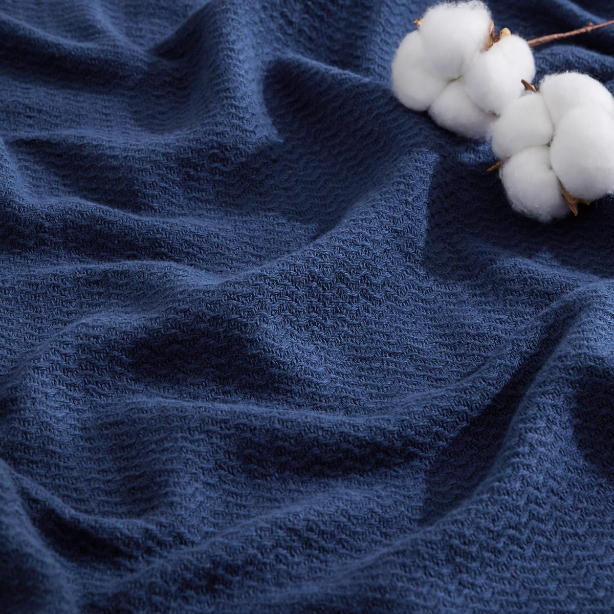 Bedsure GentleSoft 100% Cotton blanket in navy herringbone, soft and breathable for everyday use.