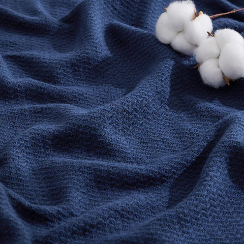 Bedsure GentleSoft 100% Cotton blanket in navy herringbone, soft and breathable for everyday use.