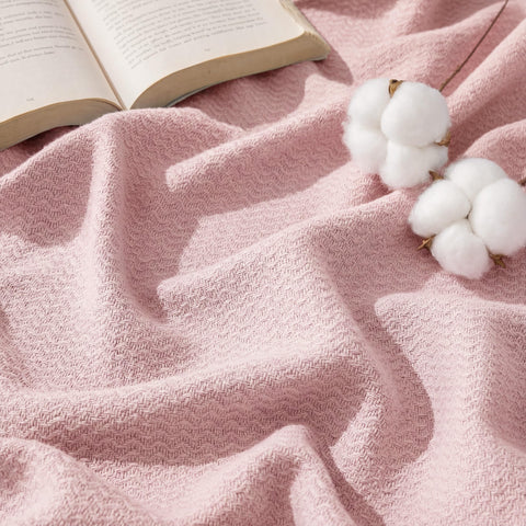 Bedsure GentleSoft 100% cotton blanket in pink with herringbone weave, breathable comfort.