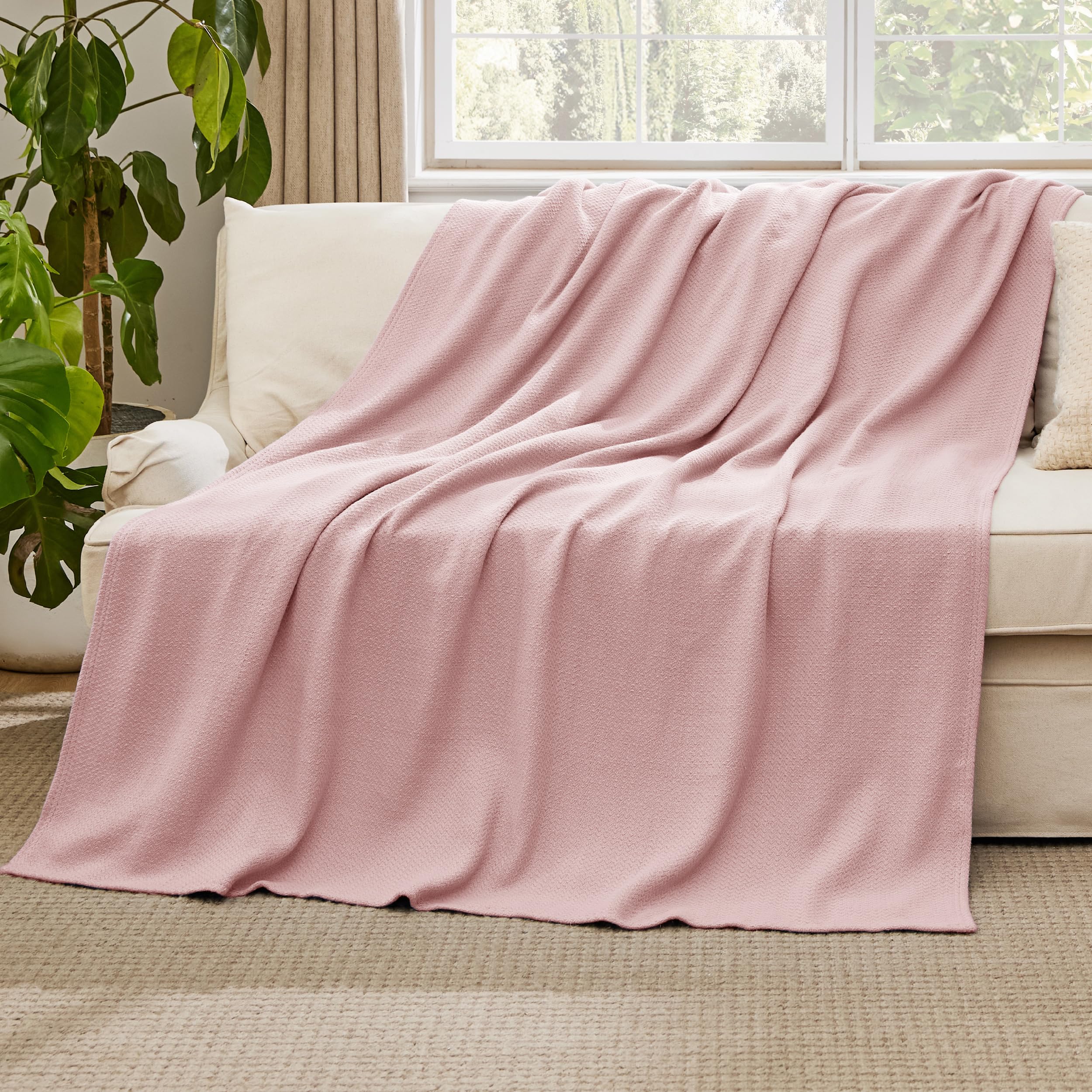 Bedsure GentleSoft 66x90 blanket on a dorm bed for airy all-season warmth.