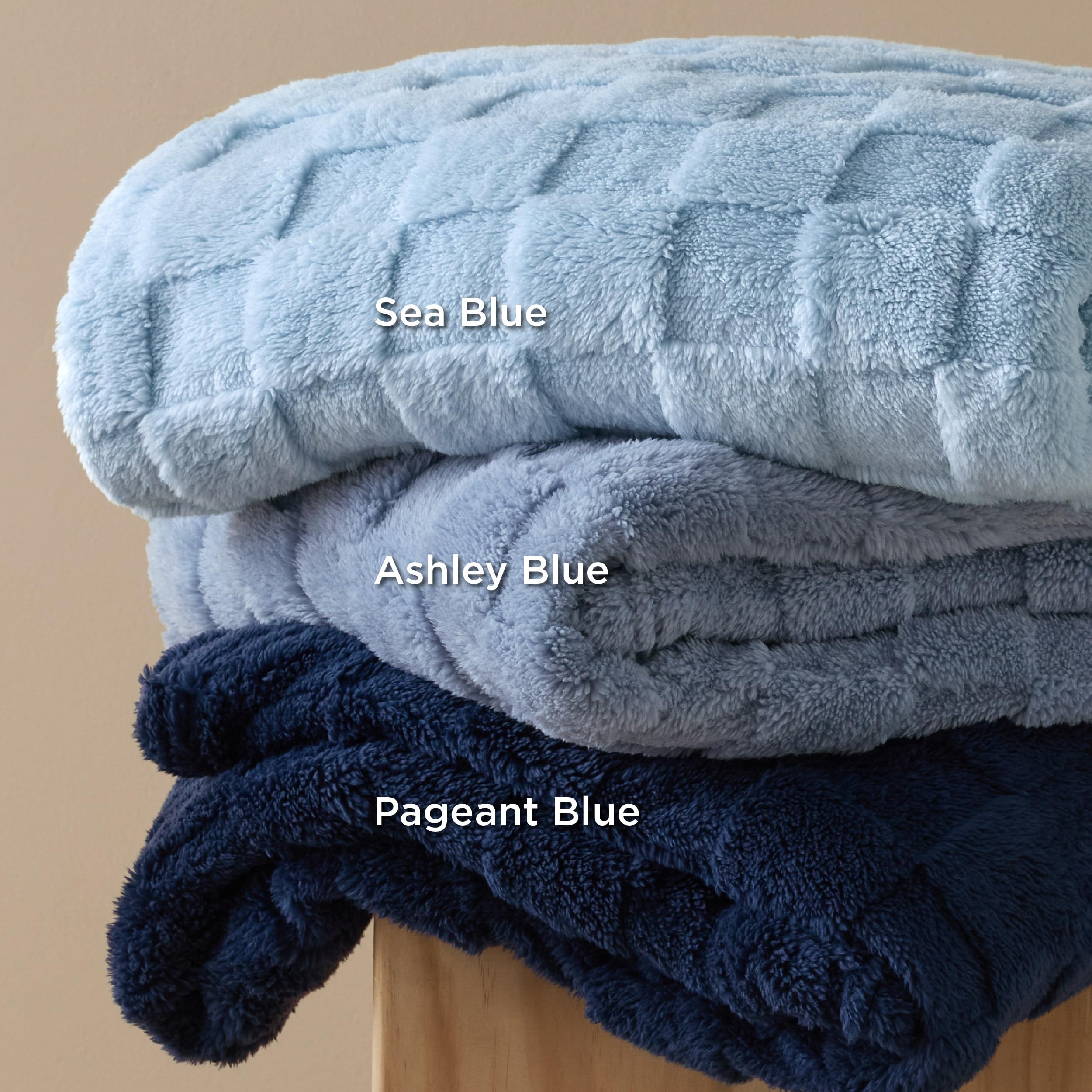 Bedsure GentleSoft Ashley Blue Throw on a chair, versatile layer for reading and study.