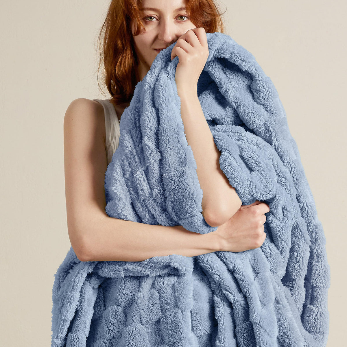 Bedsure GentleSoft Ashley Blue Throw close-up showcases ultra-soft fleece for cozy evenings.