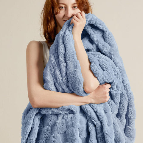 Bedsure GentleSoft Ashley Blue blanket on bed delivering ultra-soft comfort for sleep.