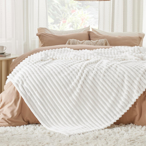 Bedsure GentleSoft off-white blanket showing fade-resistant dye technique
