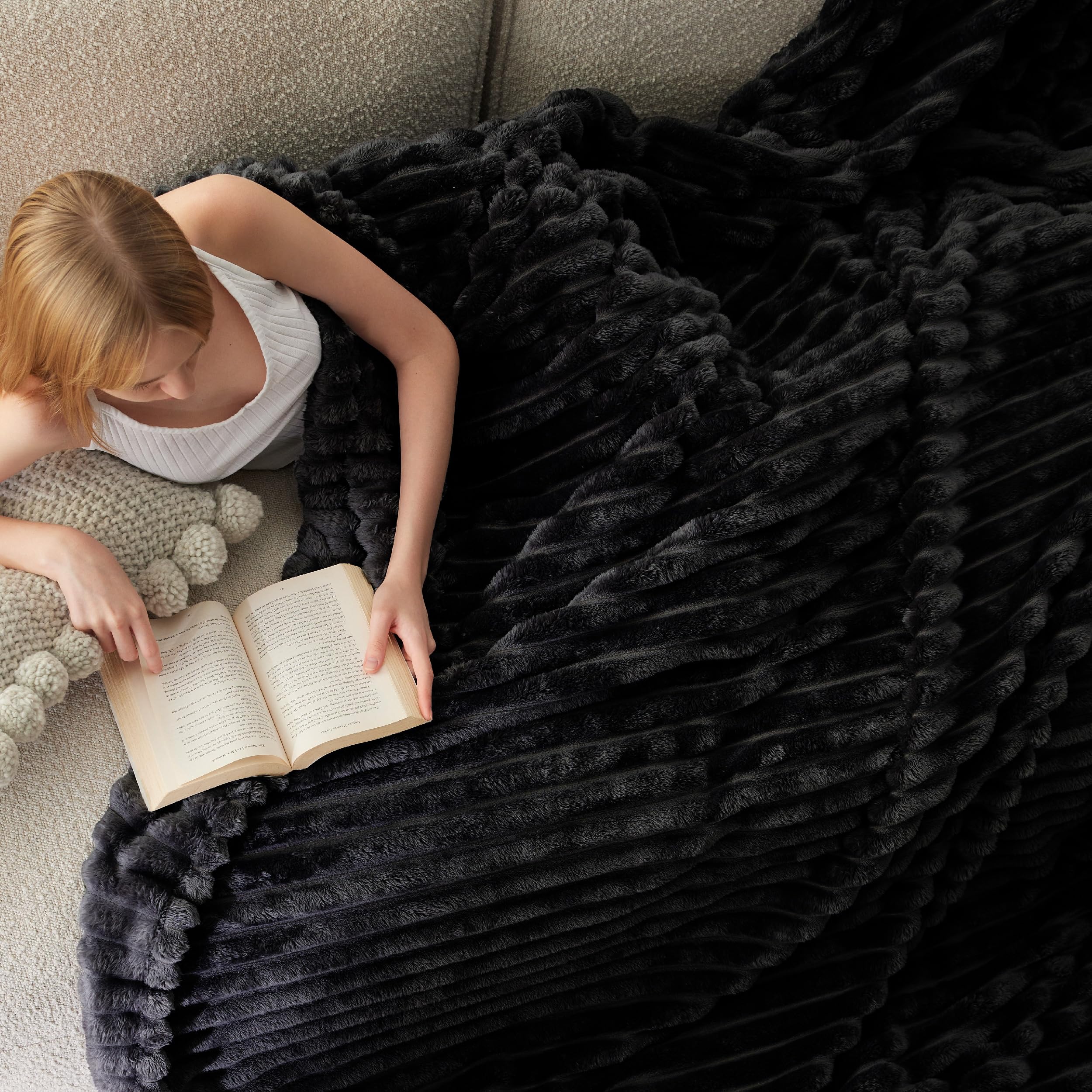 Bedsure GentleSoft blanket on a couch for movie nights and lounging comfort.