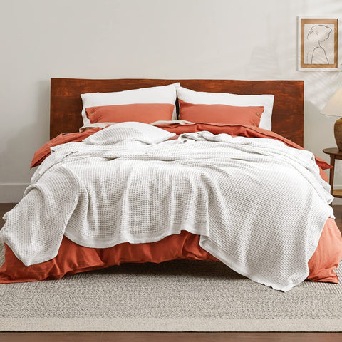 Bedsure Gentlesoft blanket on couch demonstrates versatile use for lounging.